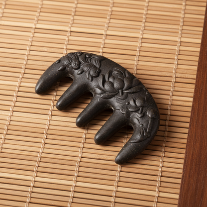 Carved Ebony Comb - Bamboo Mat Background