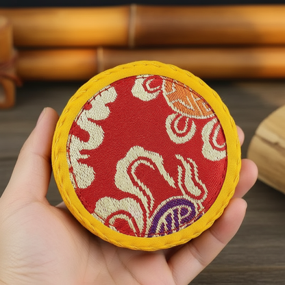 Hand holding cushion with natural background