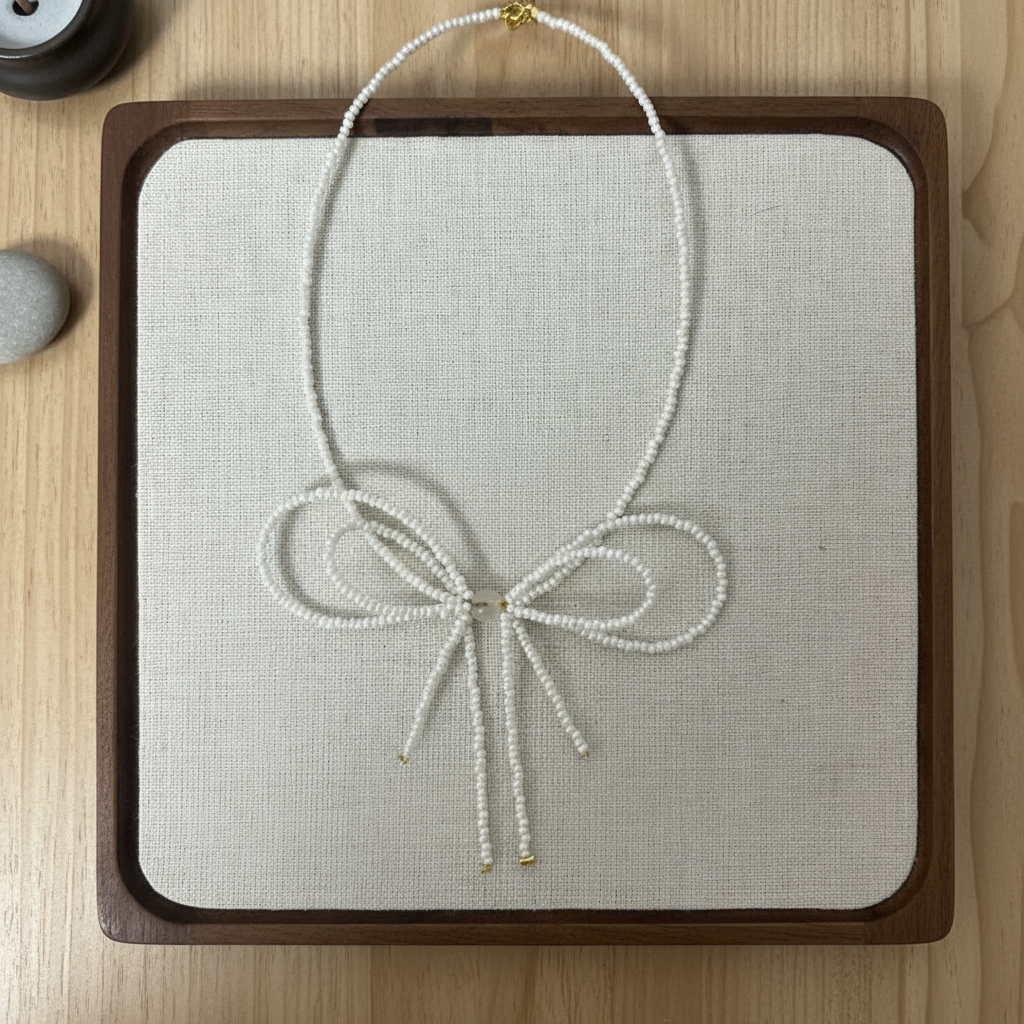 White Ribbon Necklace - Clean Top View